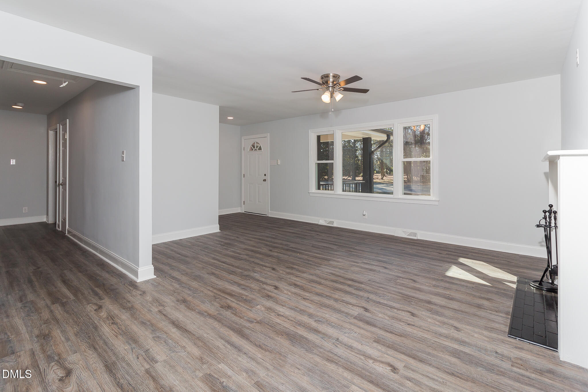 107 East New Hope Road Goldsboro, NC 27534 - Photo 16 of 33 an empty room with wooden floor chandelier and windows