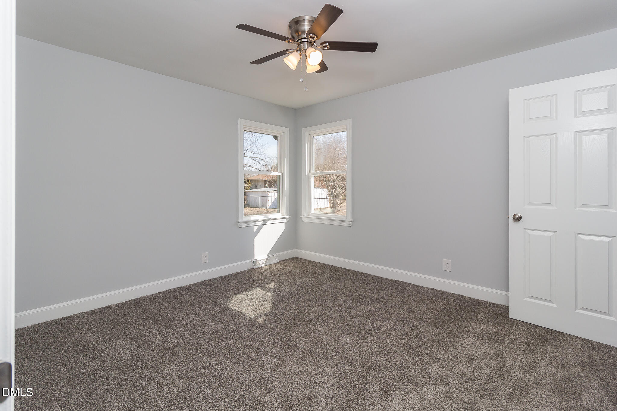 107 East New Hope Road Goldsboro, NC 27534 - Photo 23 of 33 wooden floor in an empty room with a window