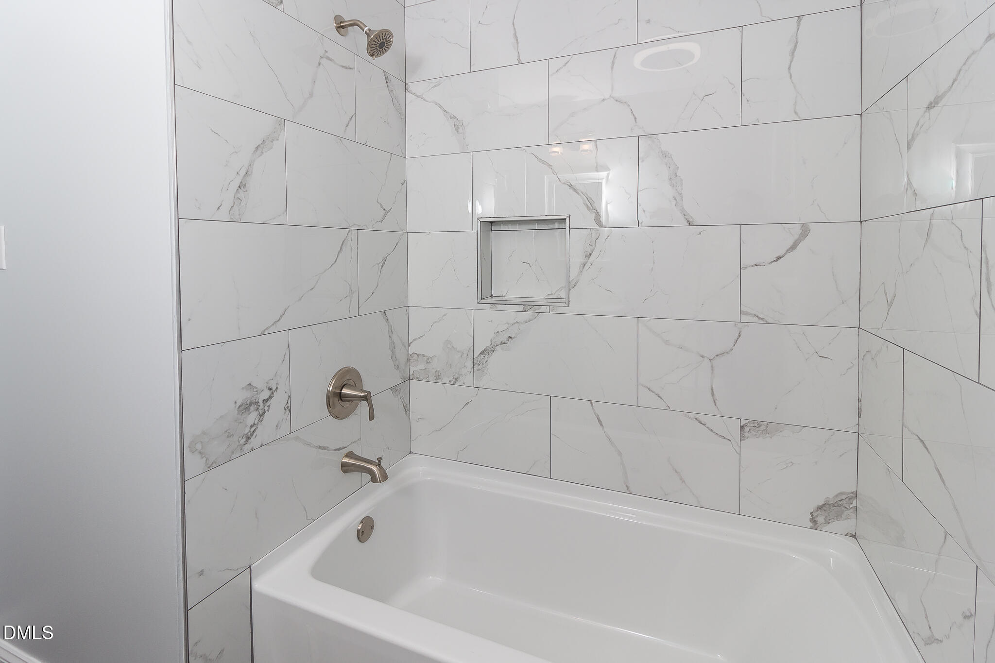 107 East New Hope Road Goldsboro, NC 27534 - Photo 26 of 33 a white bath tub sitting next to a white sink and vanity