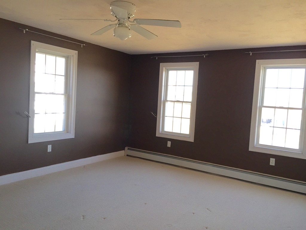 21 Winifreds Way Rutland, MA 01543 - Photo 13 of 15 a view of an empty room with a window