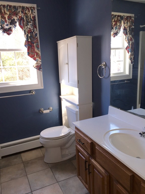 21 Winifreds Way Rutland, MA 01543 - Photo 15 of 15 a bathroom with a sink toilet and window