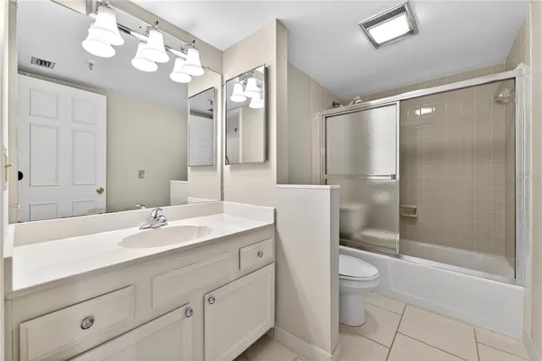 a view of a street with cars on road