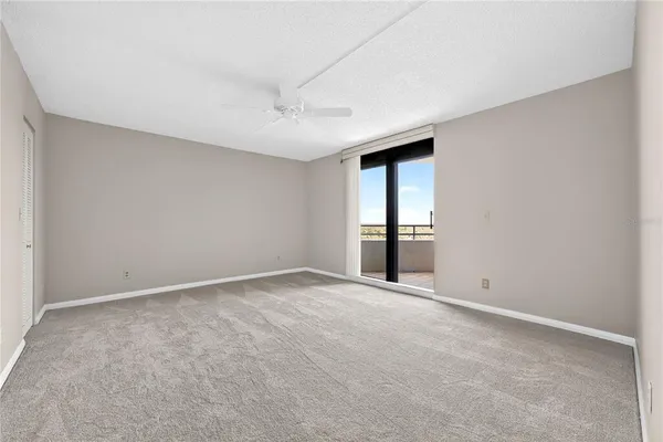 a view of a city street lined with tall buildings