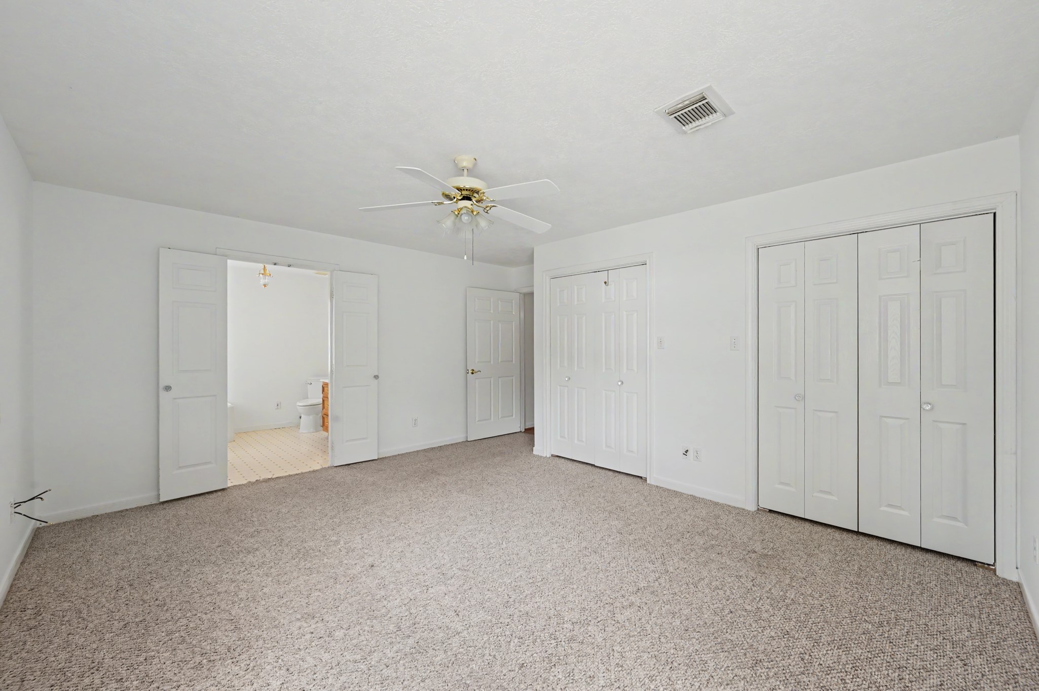 10690 Tanyard Road Willis, TX 77378 - Photo 20 of 43 Primary bedroom features an ensuite bathroom