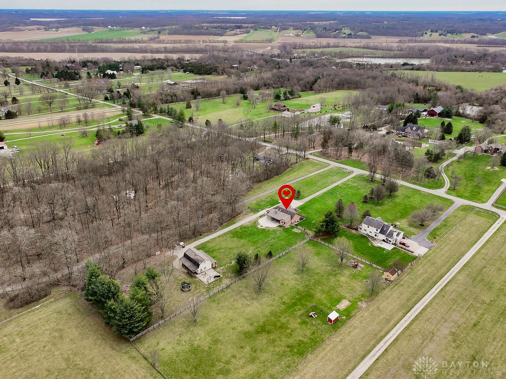 7400 Cook-Jones Road Waynesville, OH 45068 - Photo 9 of 72 An aerial view captures the sprawling property amidst a tranquil rural landscape.