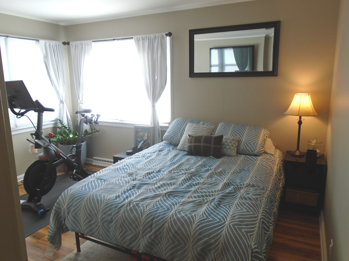 1221 7th Avenue Rochelle, IL 61068 - Photo 11 of 20 a bed sitting in a bedroom next to a window