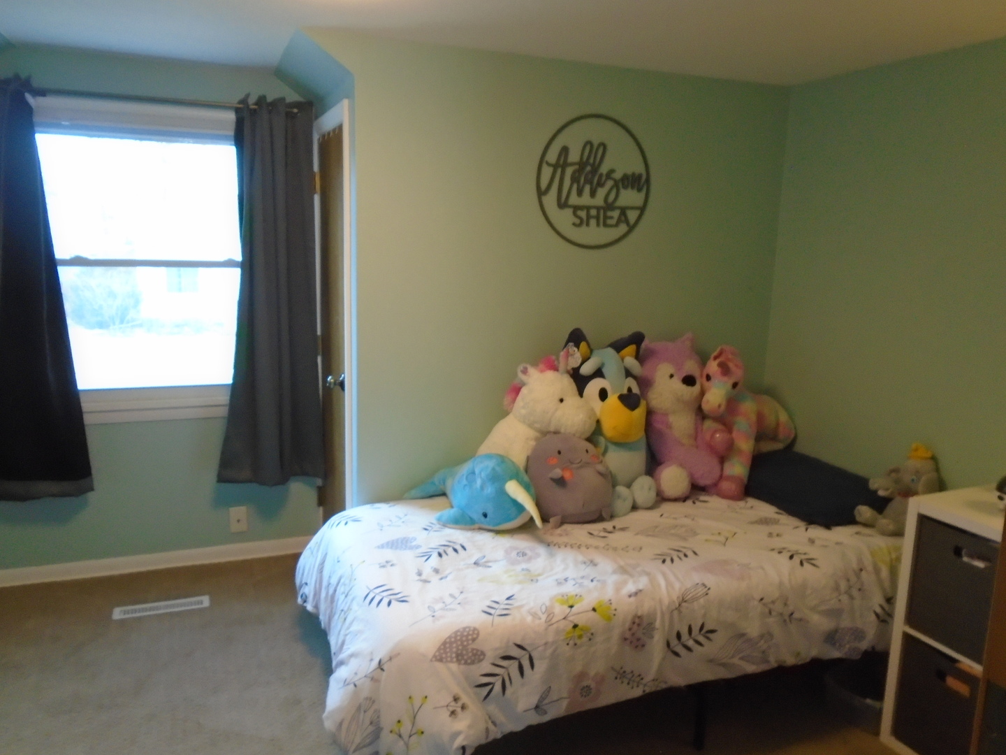 1221 7th Avenue Rochelle, IL 61068 - Photo 15 of 20 a bedroom with a bed and a window