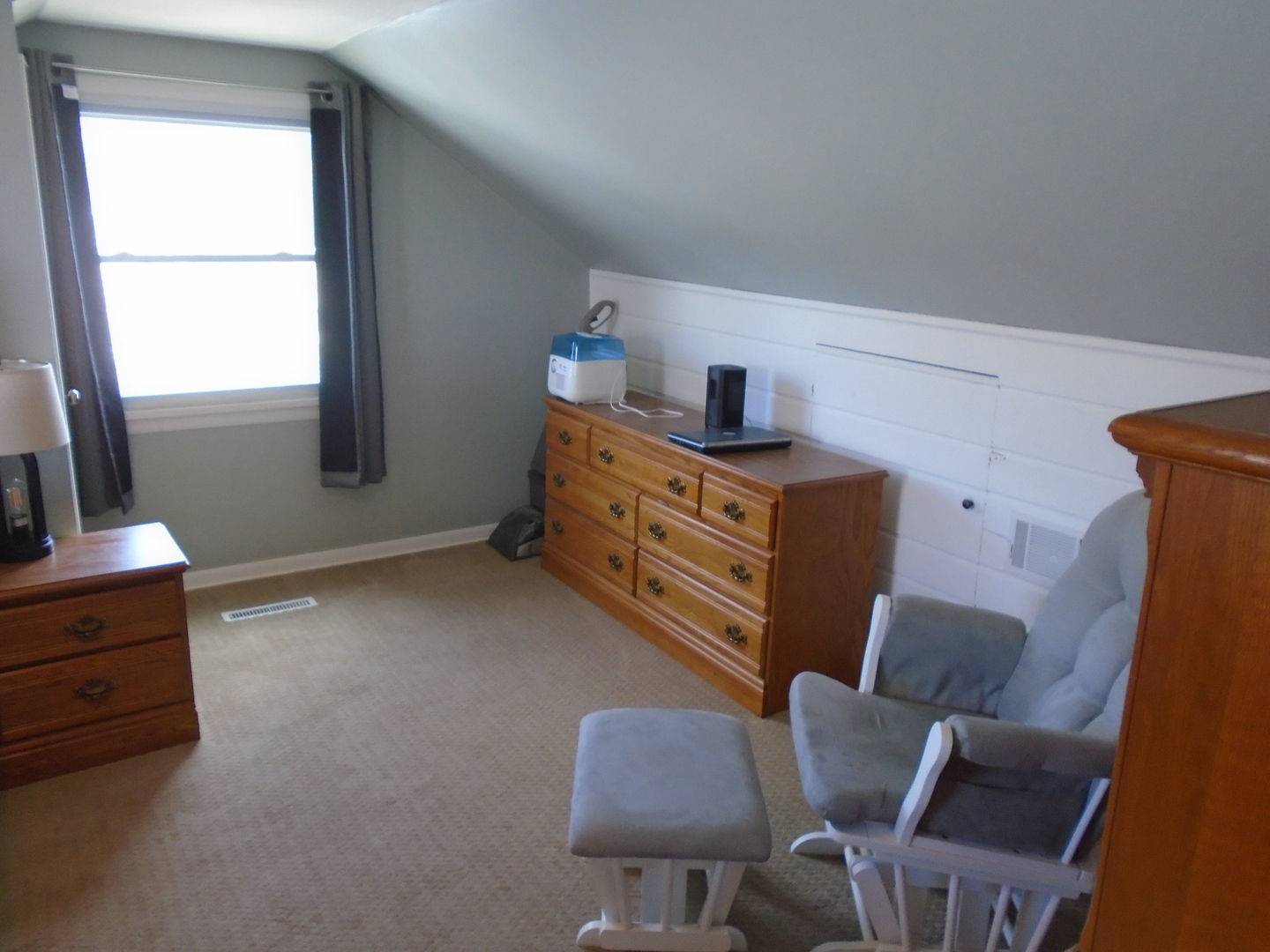 1221 7th Avenue Rochelle, IL 61068 - Photo 19 of 20 a room with furniture and a window