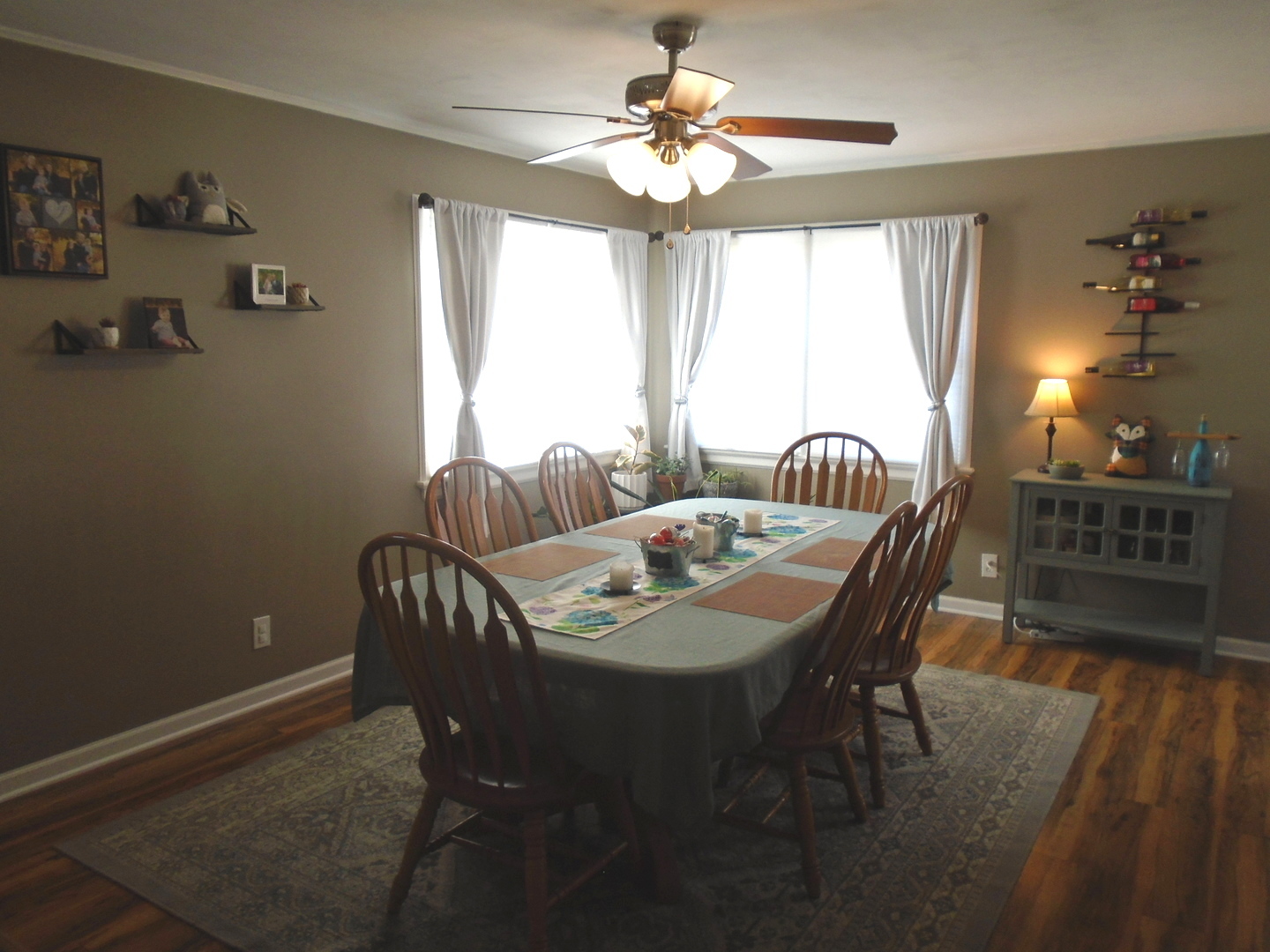 1221 7th Avenue Rochelle, IL 61068 - Photo 10 of 20 a view of a dining room with furniture window and wooden floor