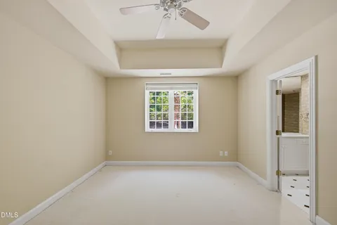 a view of balcony with wooden floor and fence