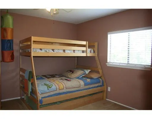 a view of bedroom with furniture