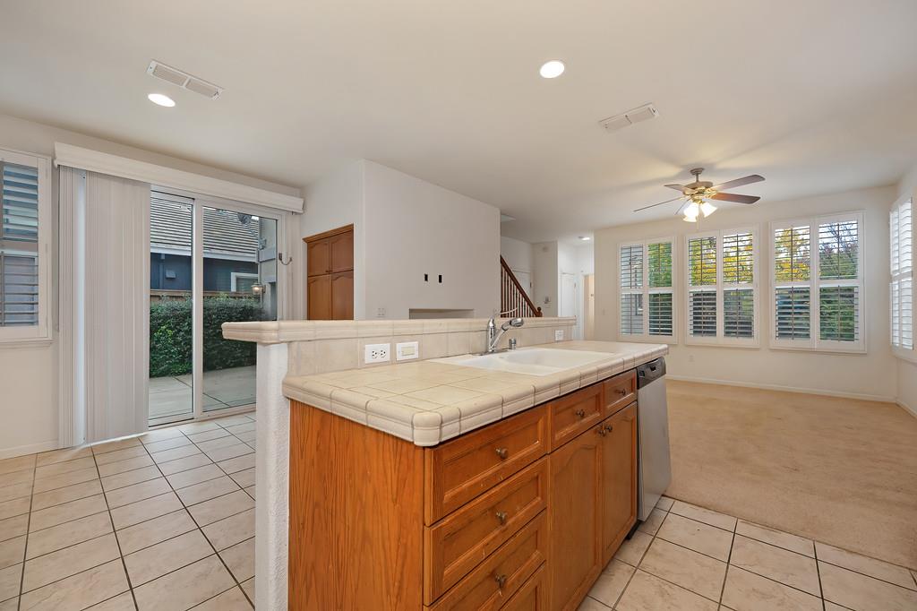 3505 Husch Way Rancho Cordova, CA 95670 - Photo 11 of 37 a kitchen with a sink a counter top space and appliances