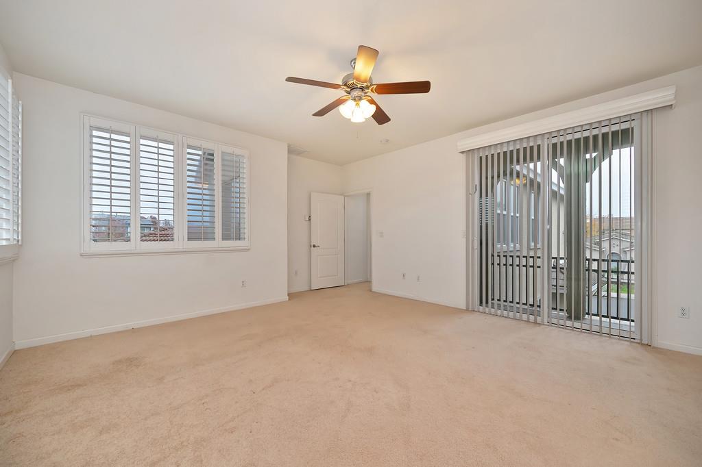 3505 Husch Way Rancho Cordova, CA 95670 - Photo 29 of 37 a view of a livingroom with a ceiling fan and window