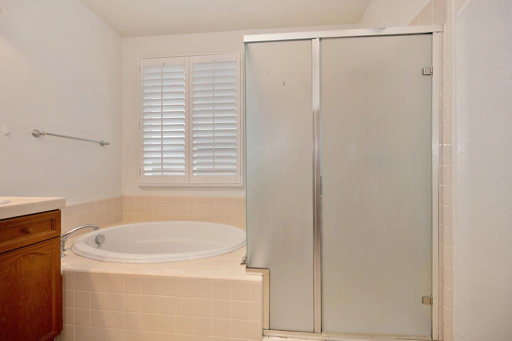 3505 Husch Way Rancho Cordova, CA 95670 - Photo 33 of 37 a bathroom with a shower and a toilet