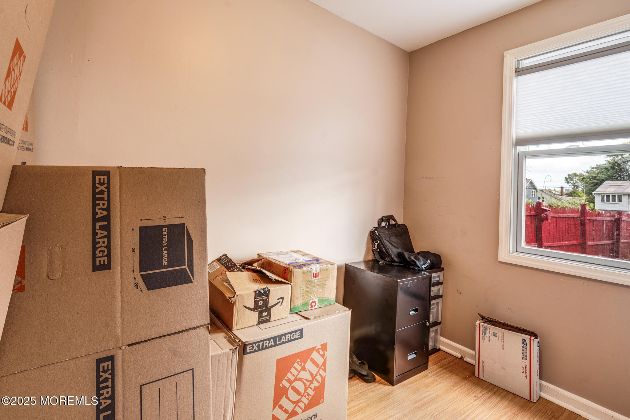 207 Delaware Avenue Cliffwood, NJ 07721 - Photo 11 of 22 a view of storage and utility room with washer and dryer