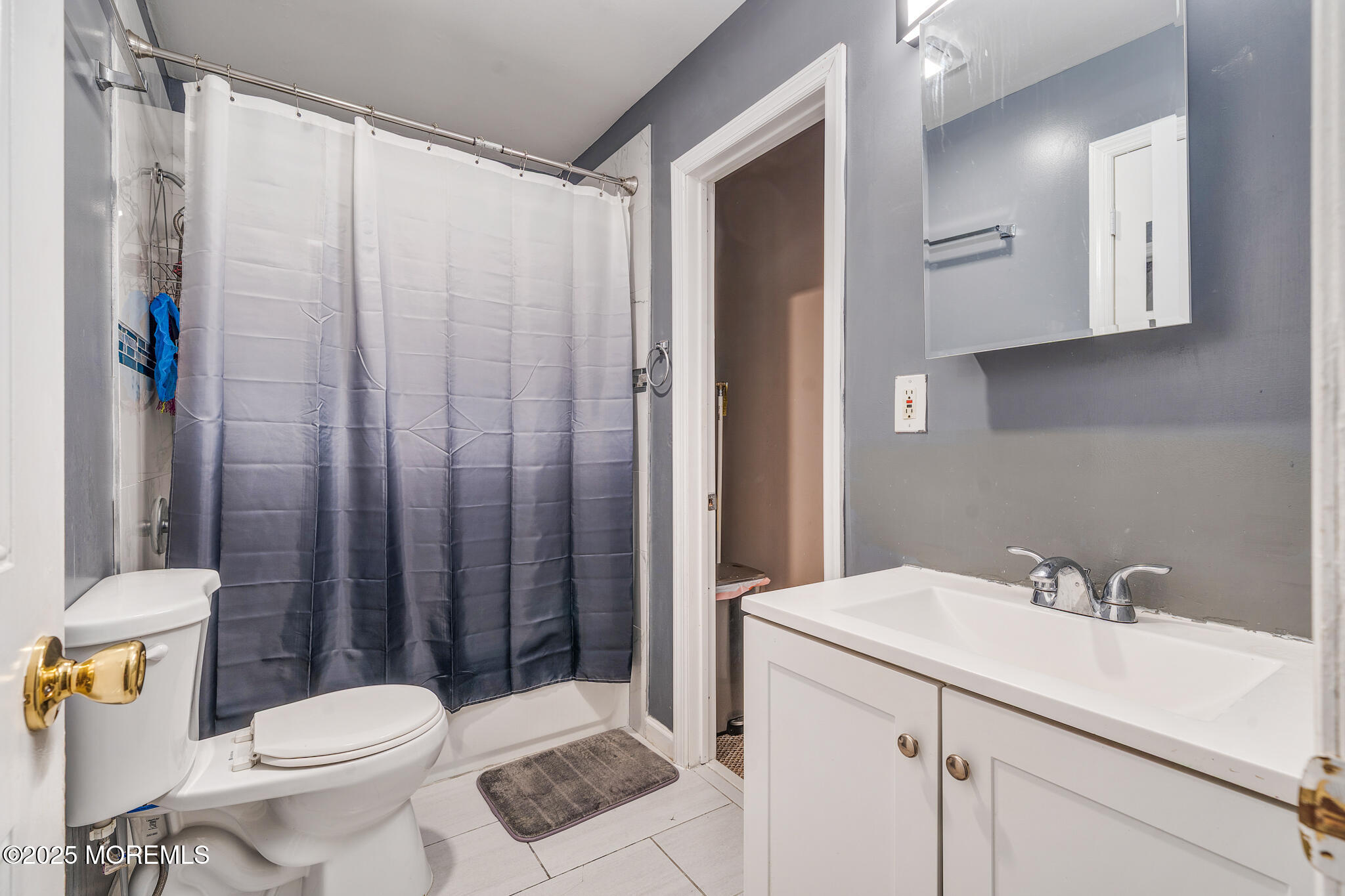 207 Delaware Avenue Cliffwood, NJ 07721 - Photo 16 of 22 a bathroom with a sink toilet and shower