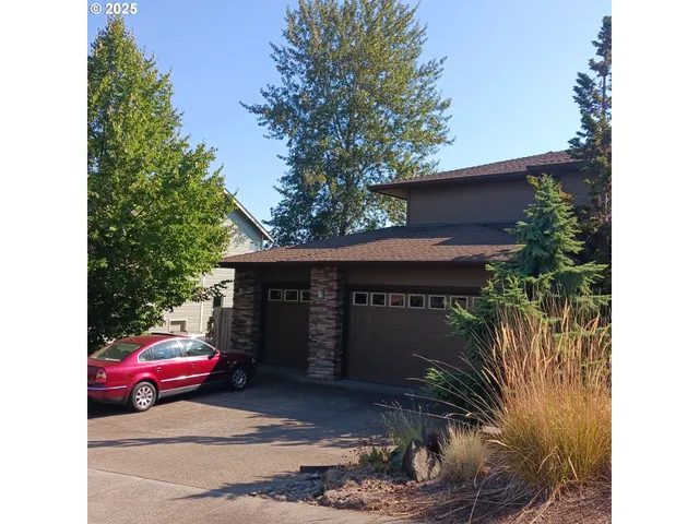a house view with a backyard space