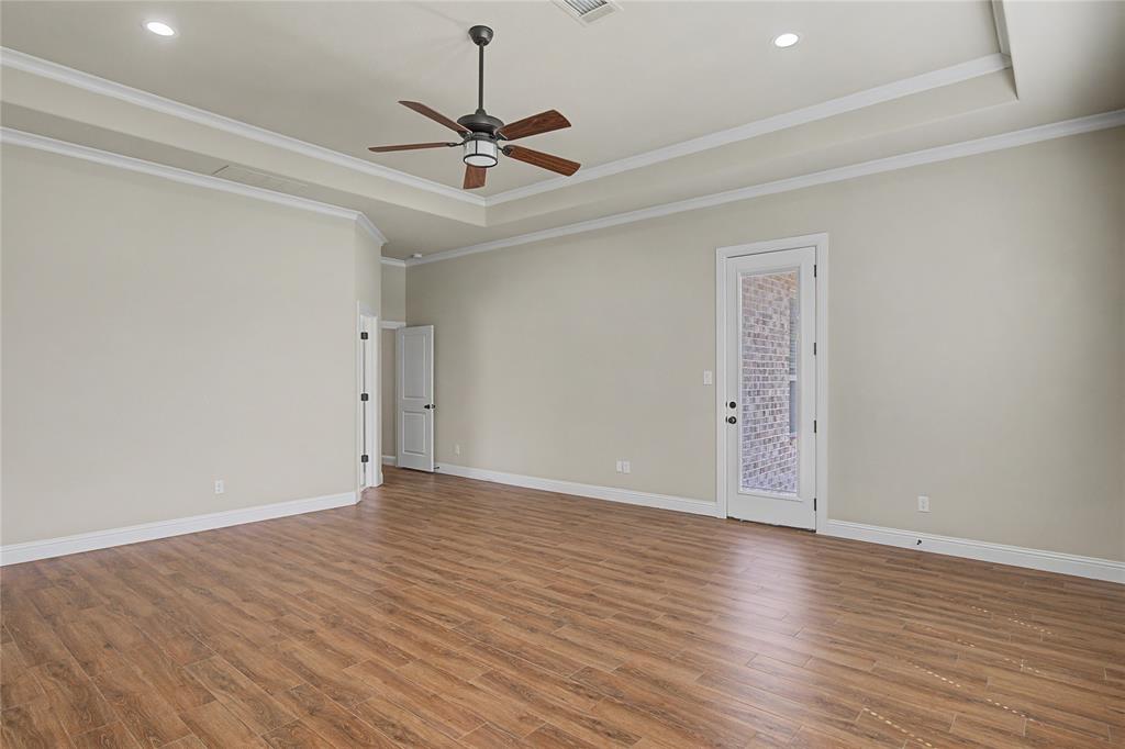 143 Wrigley Drive Springtown, TX 76082 - Photo 23 of 38 Primary suite with private door to back porch