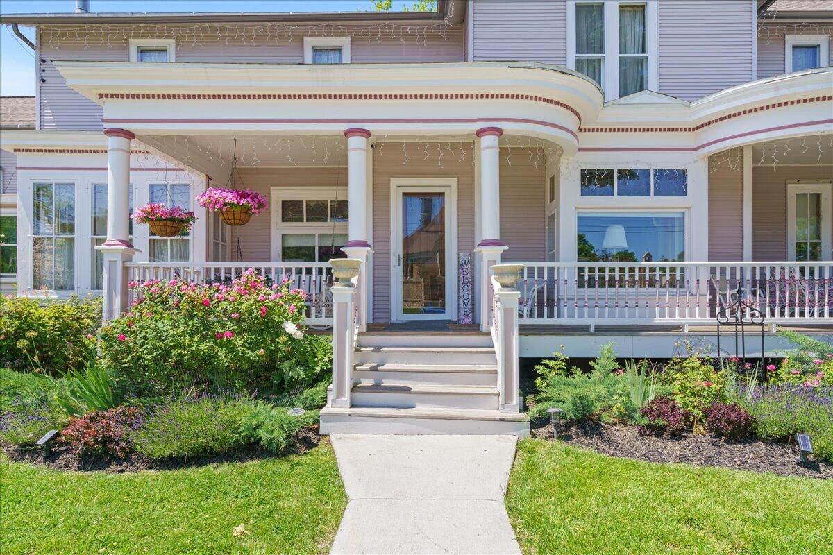 461 5th Street Manistee, MI 49660 - Photo 2 of 89 Side entrance