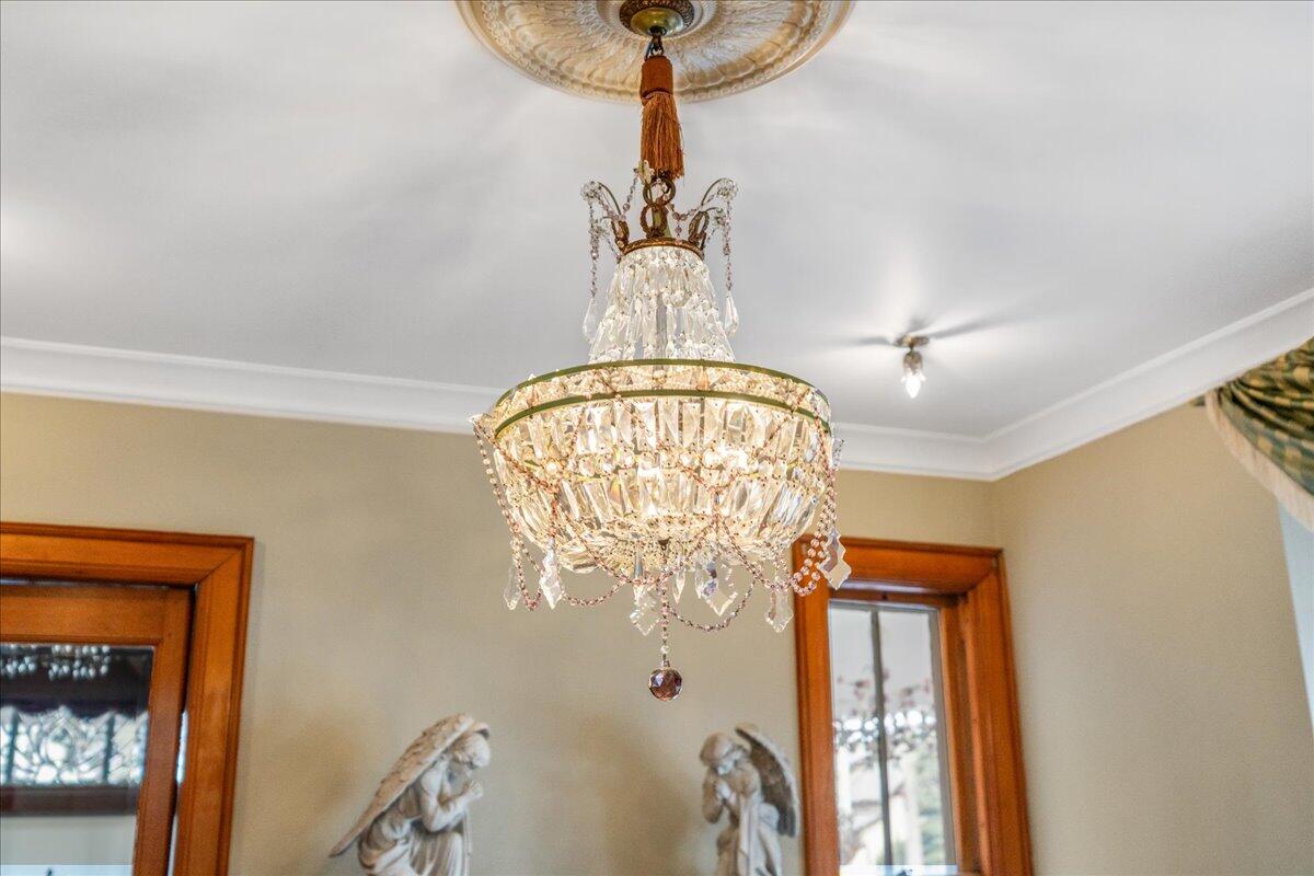461 5th Street Manistee, MI 49660 - Photo 24 of 89 Front living area chandelier