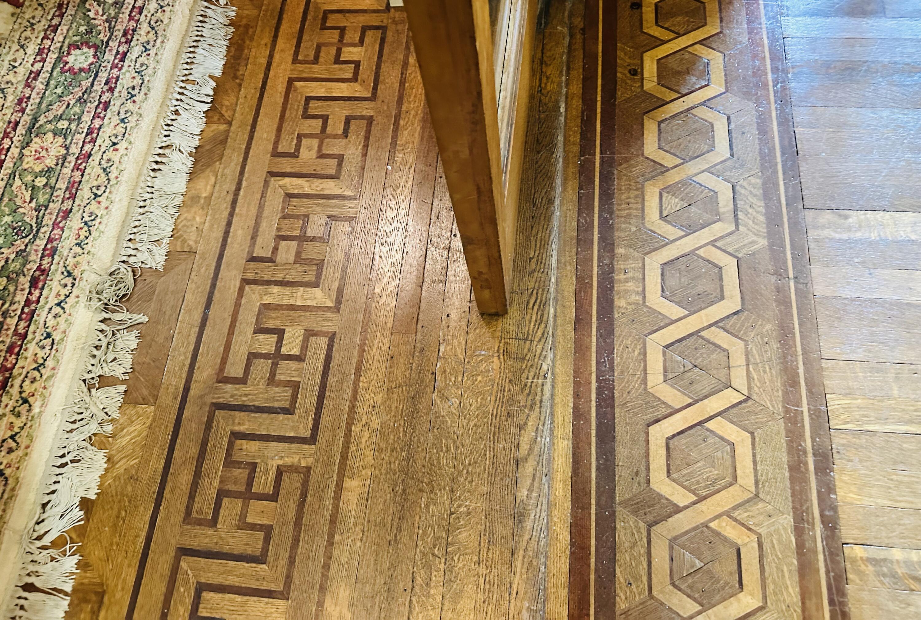 461 5th Street Manistee, MI 49660 - Photo 25 of 89 Inlaid detail of wood flooring