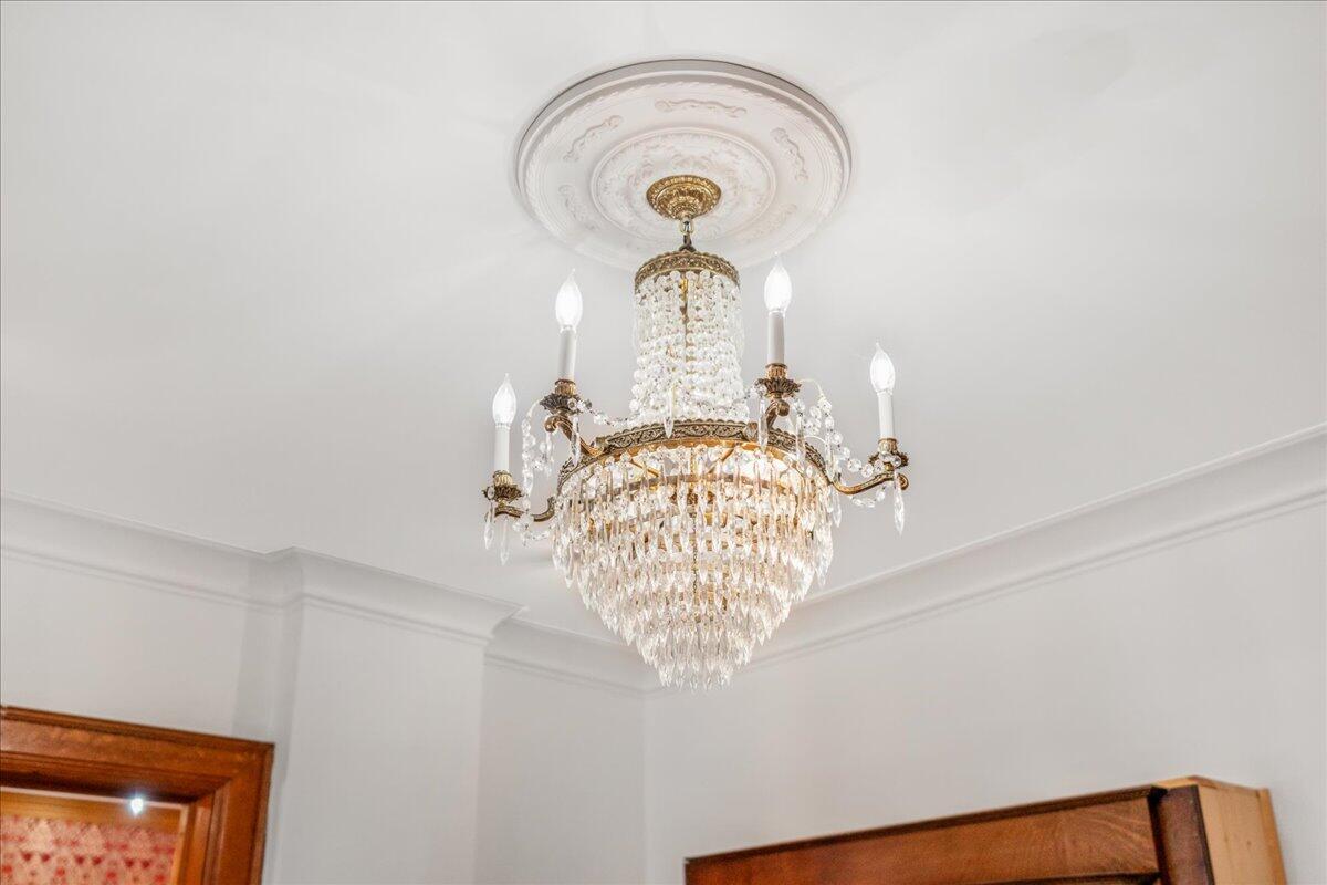 461 5th Street Manistee, MI 49660 - Photo 28 of 89 Chandelier in entry/foyer