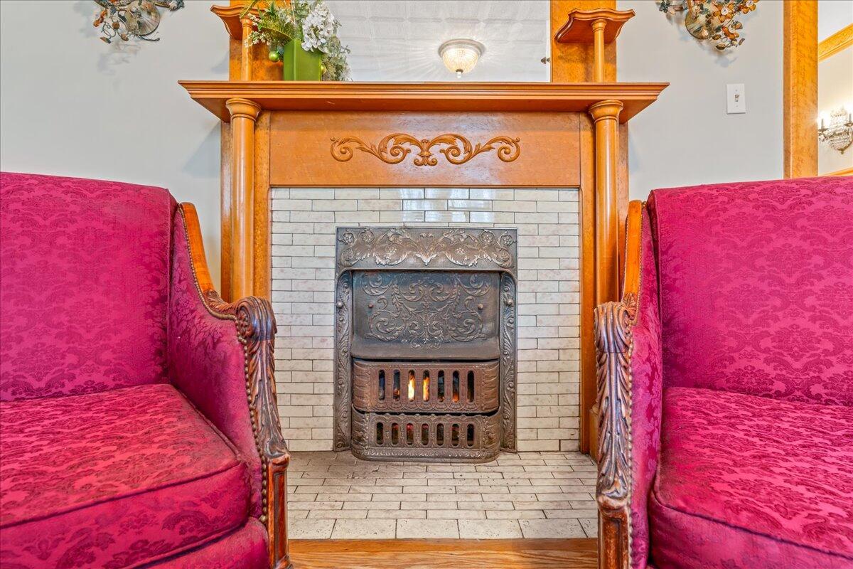 461 5th Street Manistee, MI 49660 - Photo 30 of 89 Beautifully carved wood fireplaces