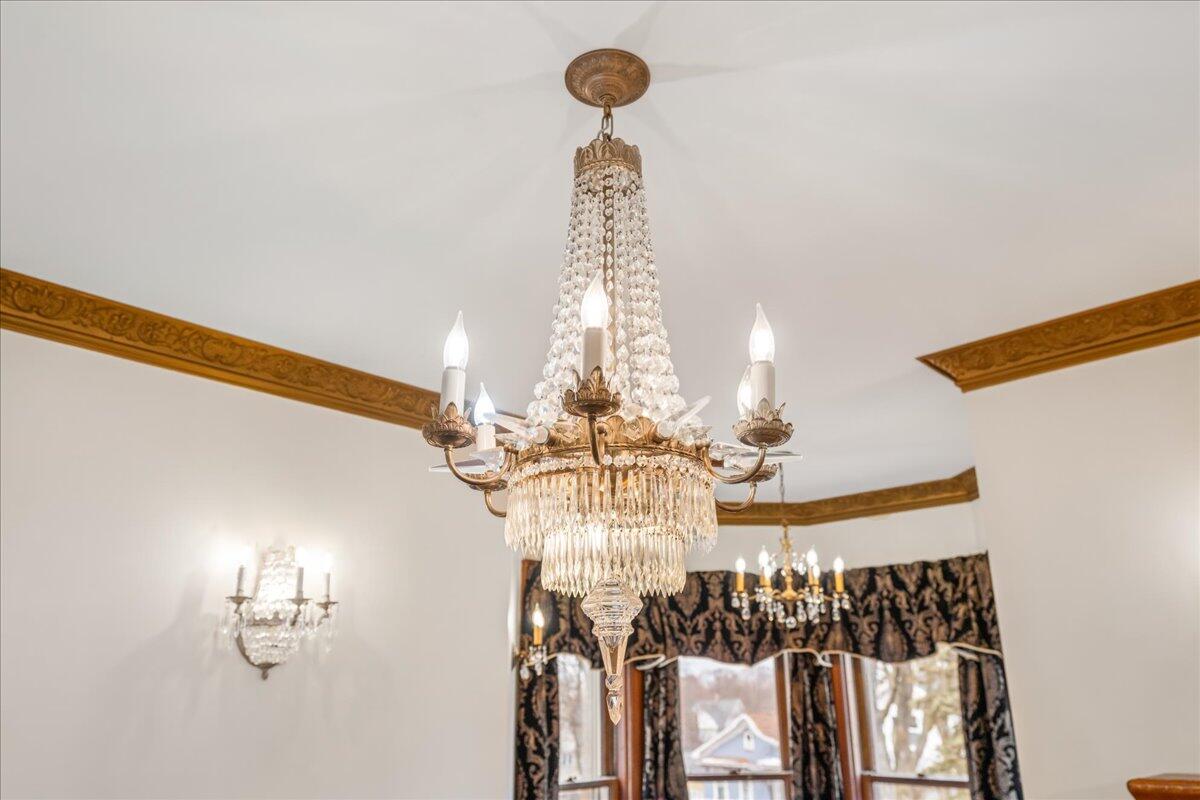 461 5th Street Manistee, MI 49660 - Photo 50 of 89 Chandelier at top of stairs