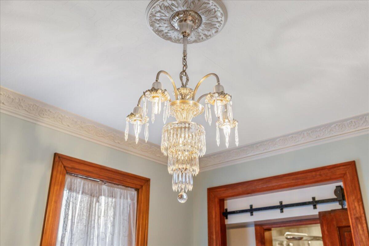 461 5th Street Manistee, MI 49660 - Photo 60 of 89 Chandelier in bedroom 4