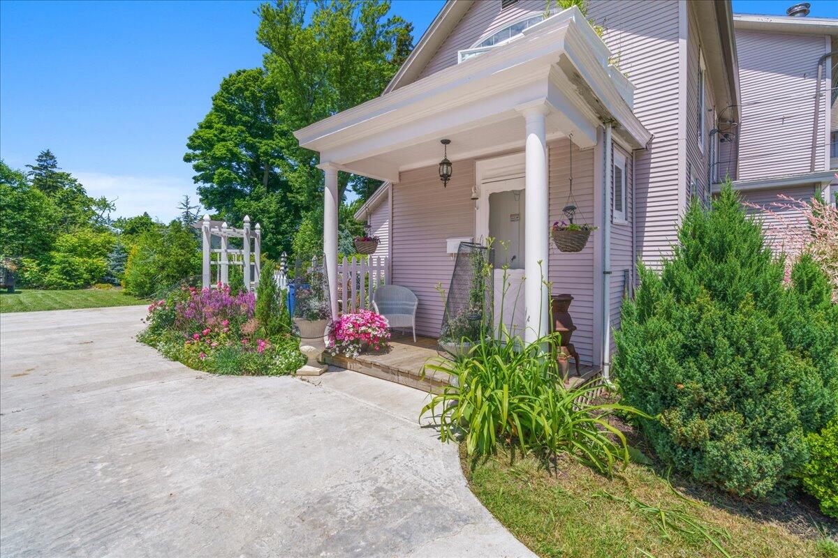 461 5th Street Manistee, MI 49660 - Photo 73 of 89 Backdoor to parking area