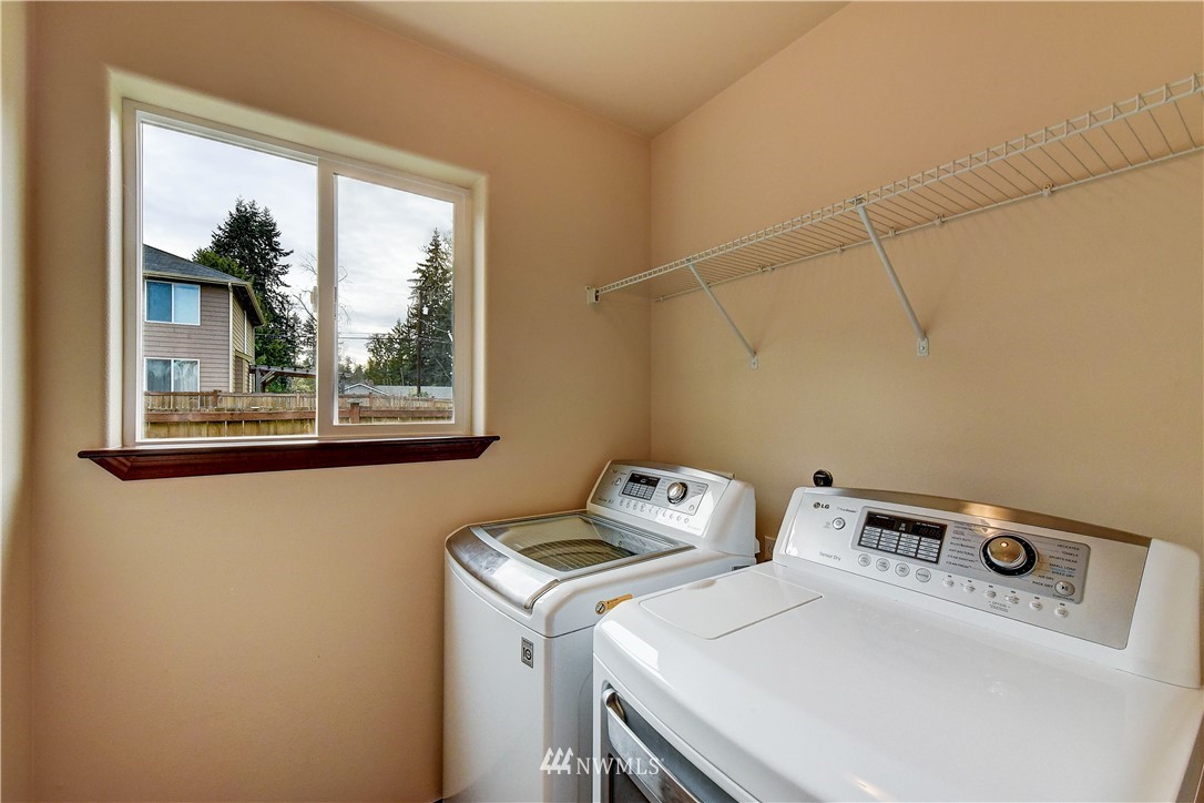 2213 239th Place Southwest Bothell, WA 98021 - Photo 22 of 25 a utility room with dryer and washer
