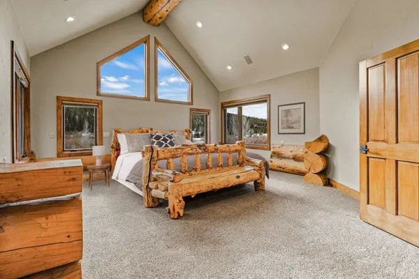 a bed room with a bed and a couch
