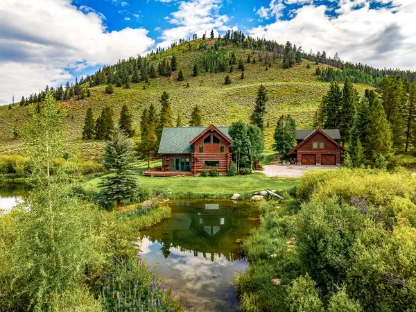 a view of lake with green space