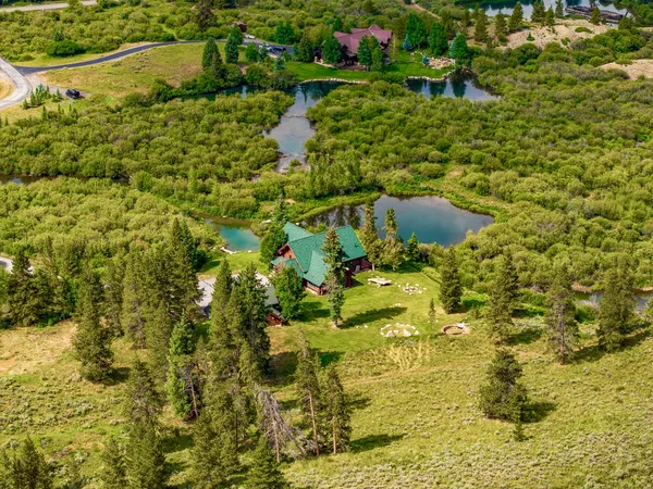a view of a lake with a yard