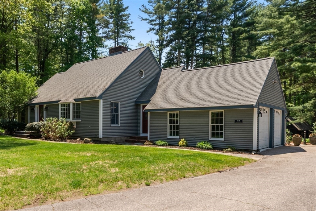 49 Walpole Street Dover, MA 02030 - Photo 40 of 40 a view of a house with garden and yard