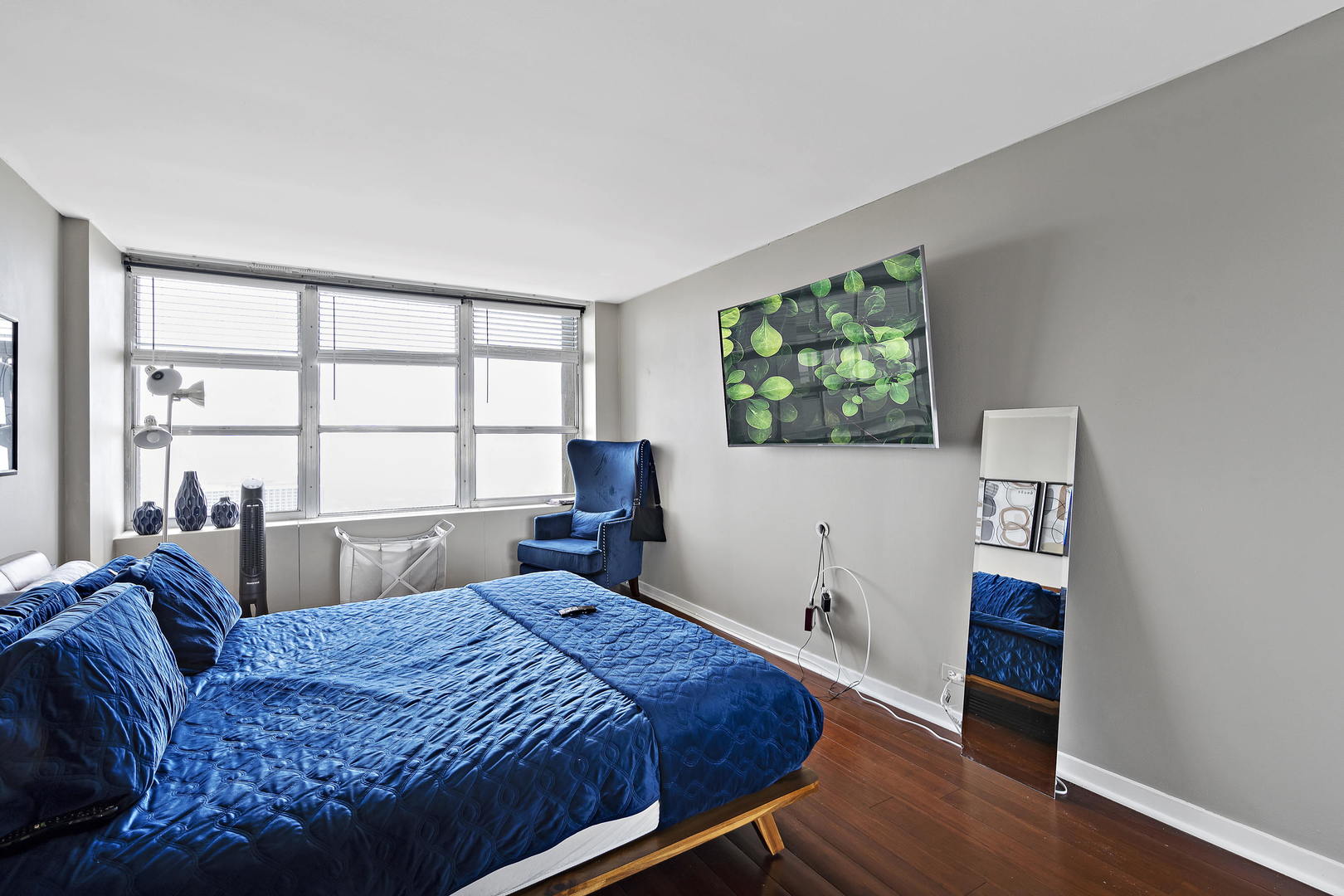 655 West Irving Park Road, Unit 4108 Chicago, IL 60613 - Photo 11 of 32 a bedroom with a bed and a large window