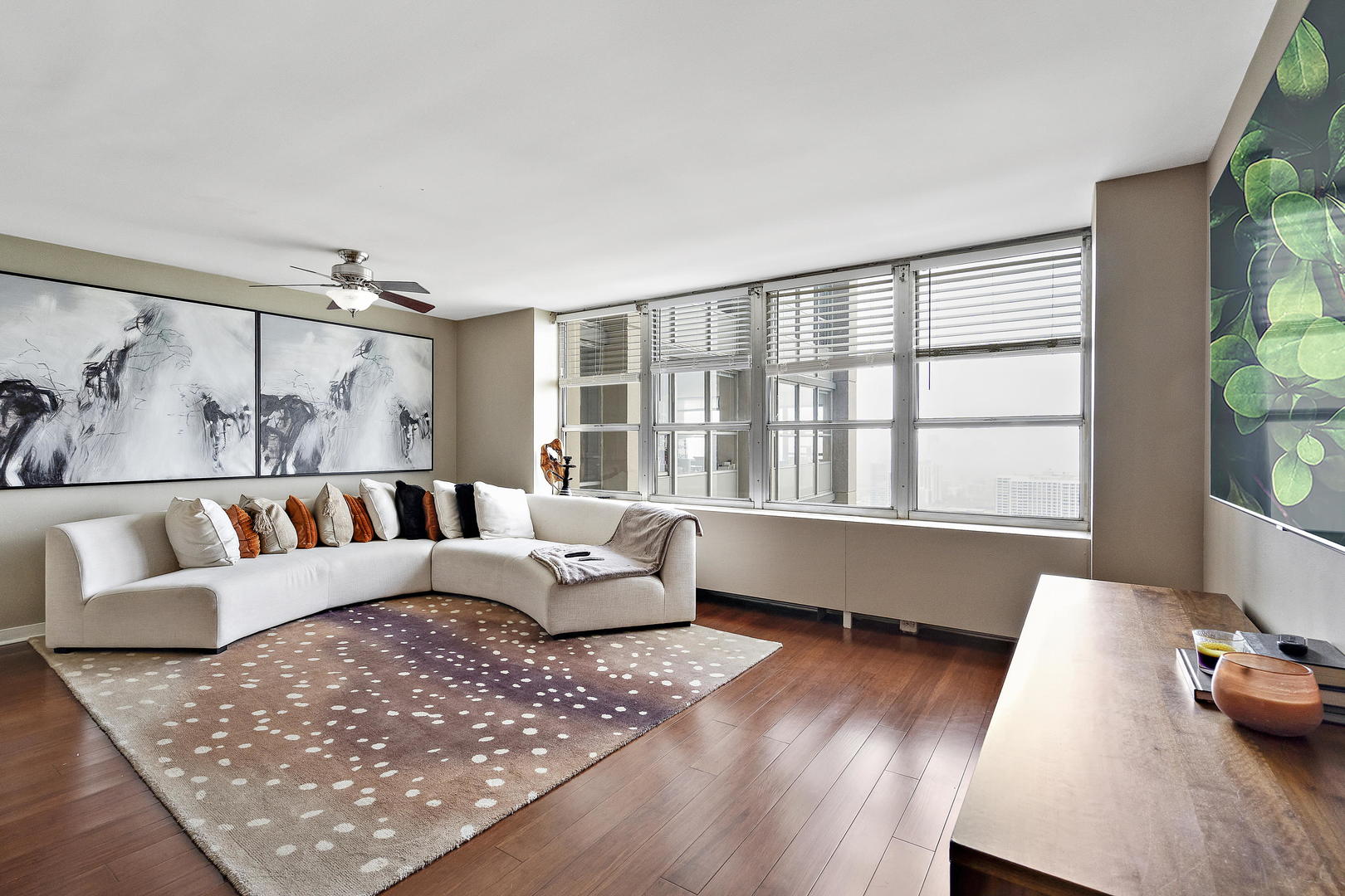 655 West Irving Park Road, Unit 4108 Chicago, IL 60613 - Photo 3 of 32 a living room with furniture and a large window