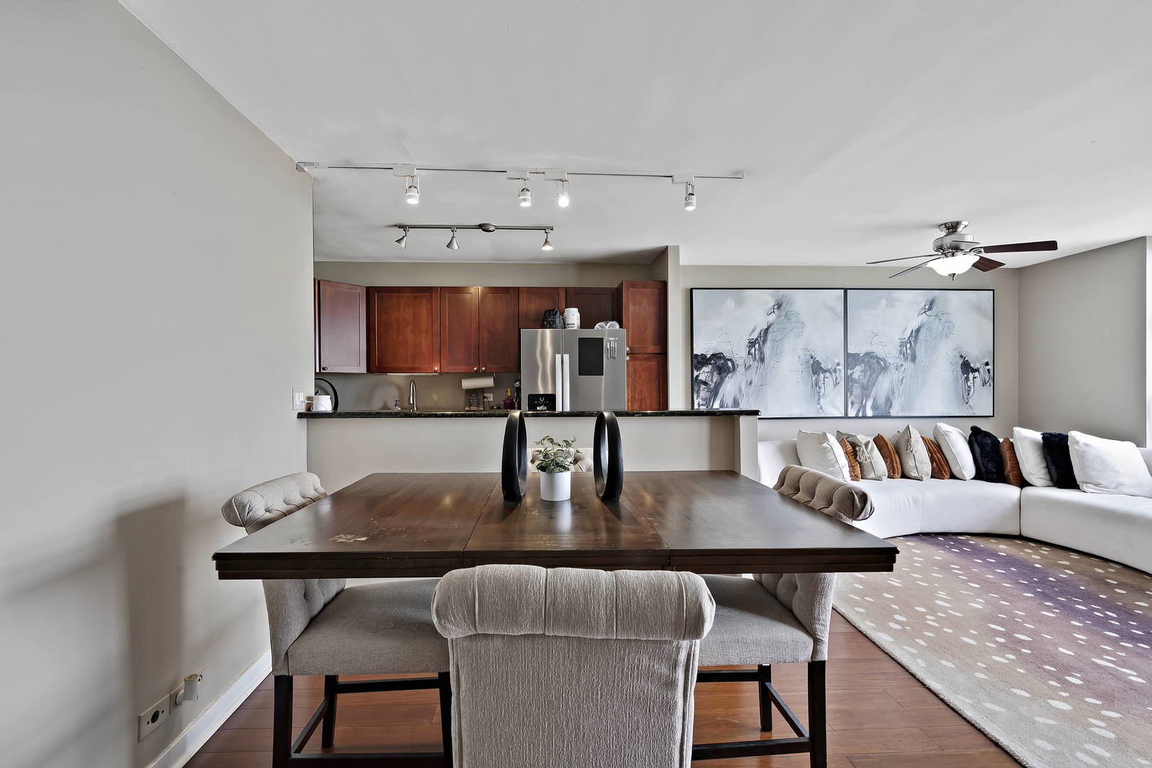 655 West Irving Park Road, Unit 4108 Chicago, IL 60613 - Photo 6 of 32 a view of kitchen and dining area with furniture