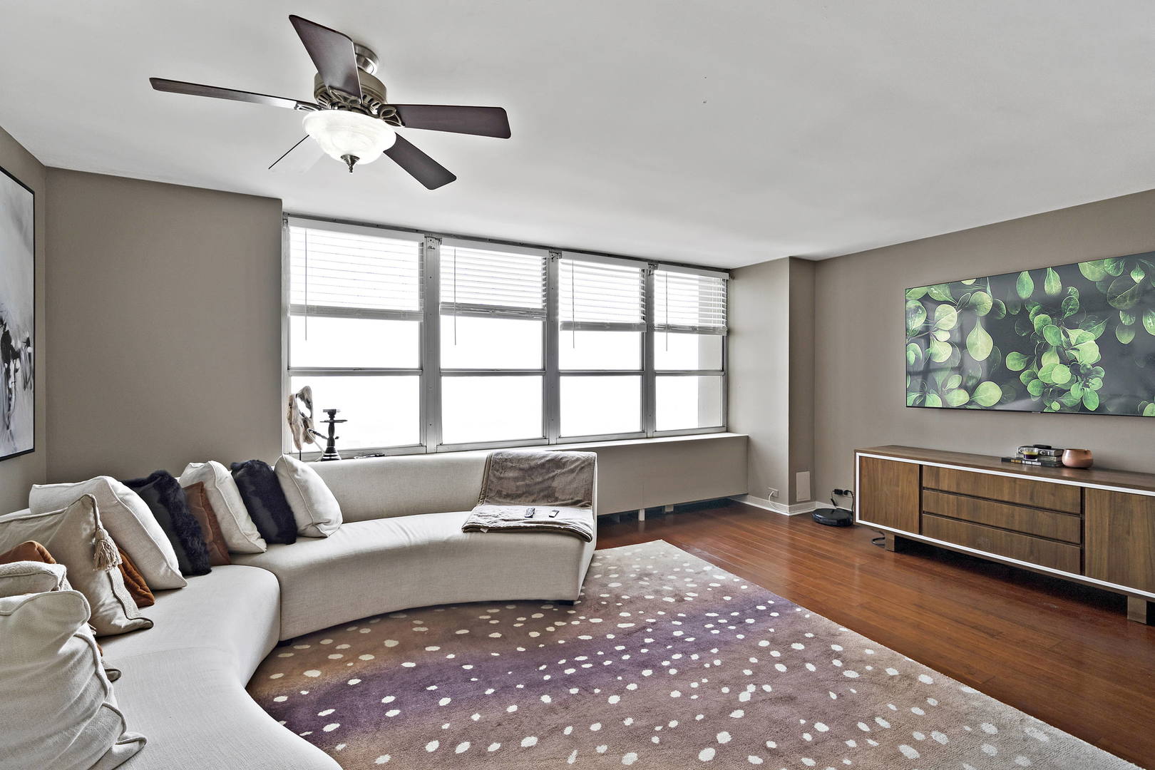 655 West Irving Park Road, Unit 4108 Chicago, IL 60613 - Photo 7 of 32 a living room with furniture and a window