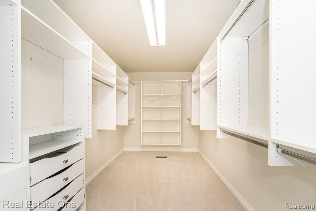 5575 Murfield Drive Rochester, MI 48306 - Photo 27 of 53 2 of 2 Primary Bedroom walk-in closets (15x7)