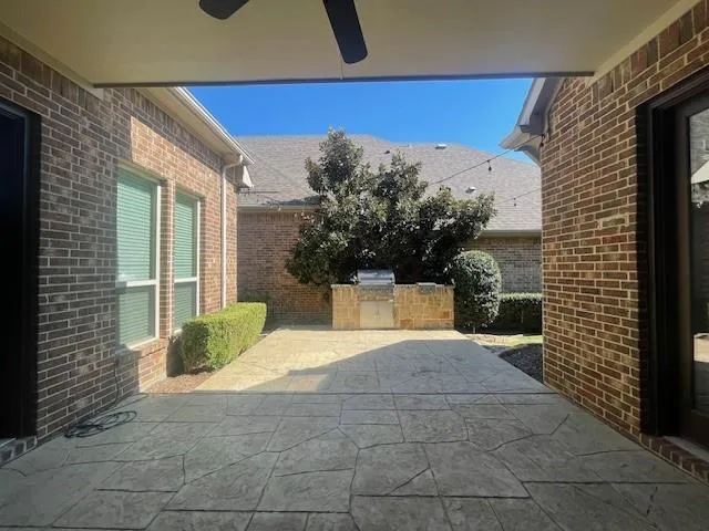 a view of a back yard of the house