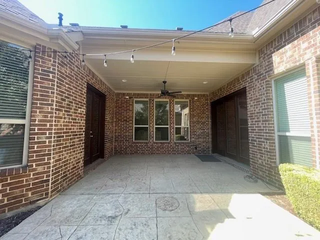 a view of a room with a large window