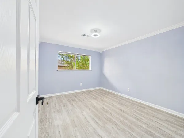 an empty room with windows