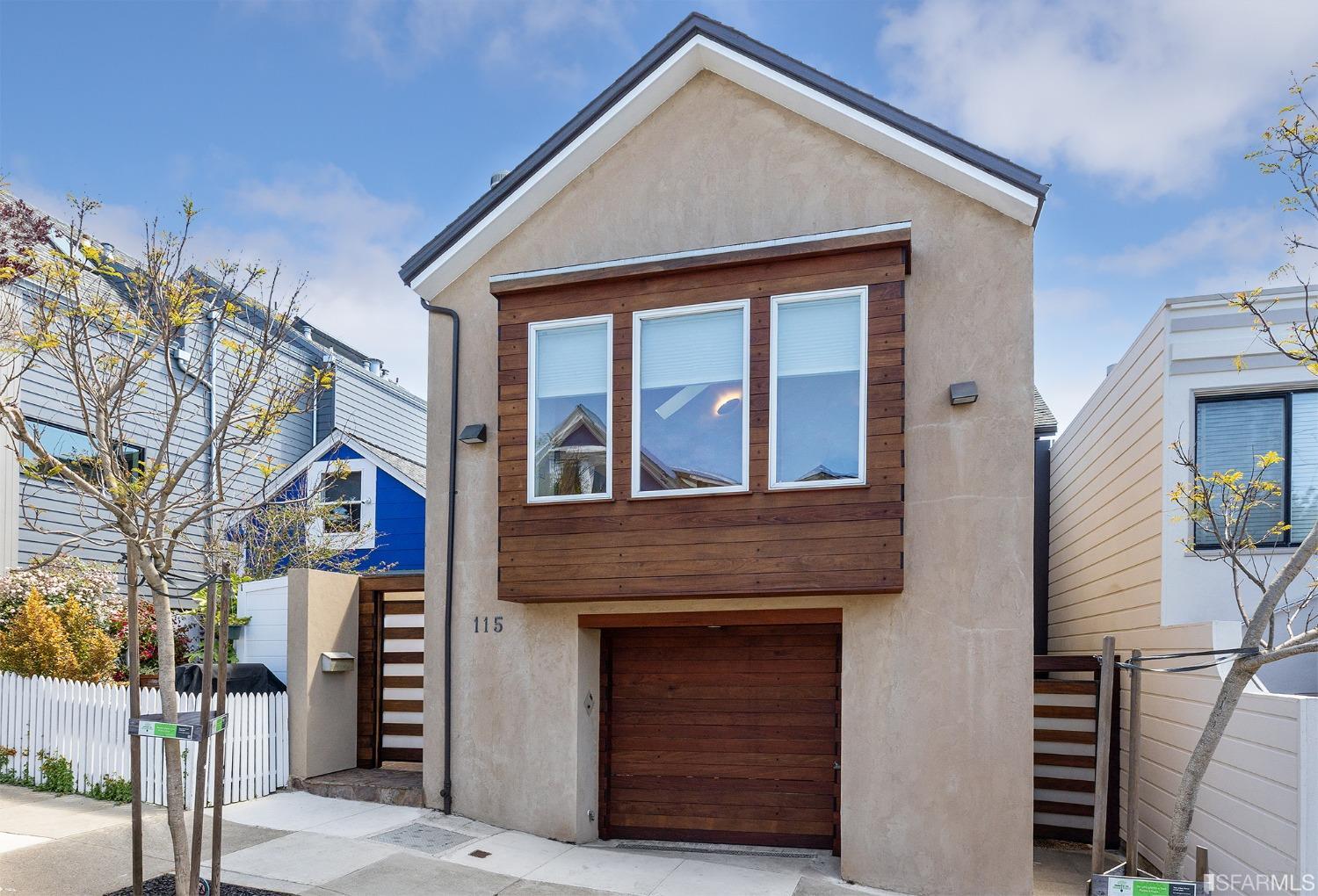 115 Wool Street San Francisco, CA 94110 - Photo 1 of 37 a front view of a house with a yard