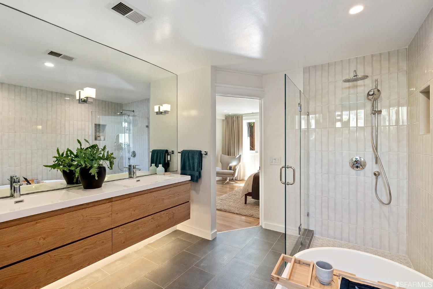 115 Wool Street San Francisco, CA 94110 - Photo 13 of 37 a spacious bathroom with a double vanity sink toilet and shower