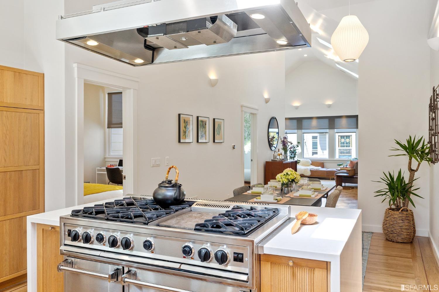 115 Wool Street San Francisco, CA 94110 - Photo 20 of 37 a kitchen with a stove and cabinets