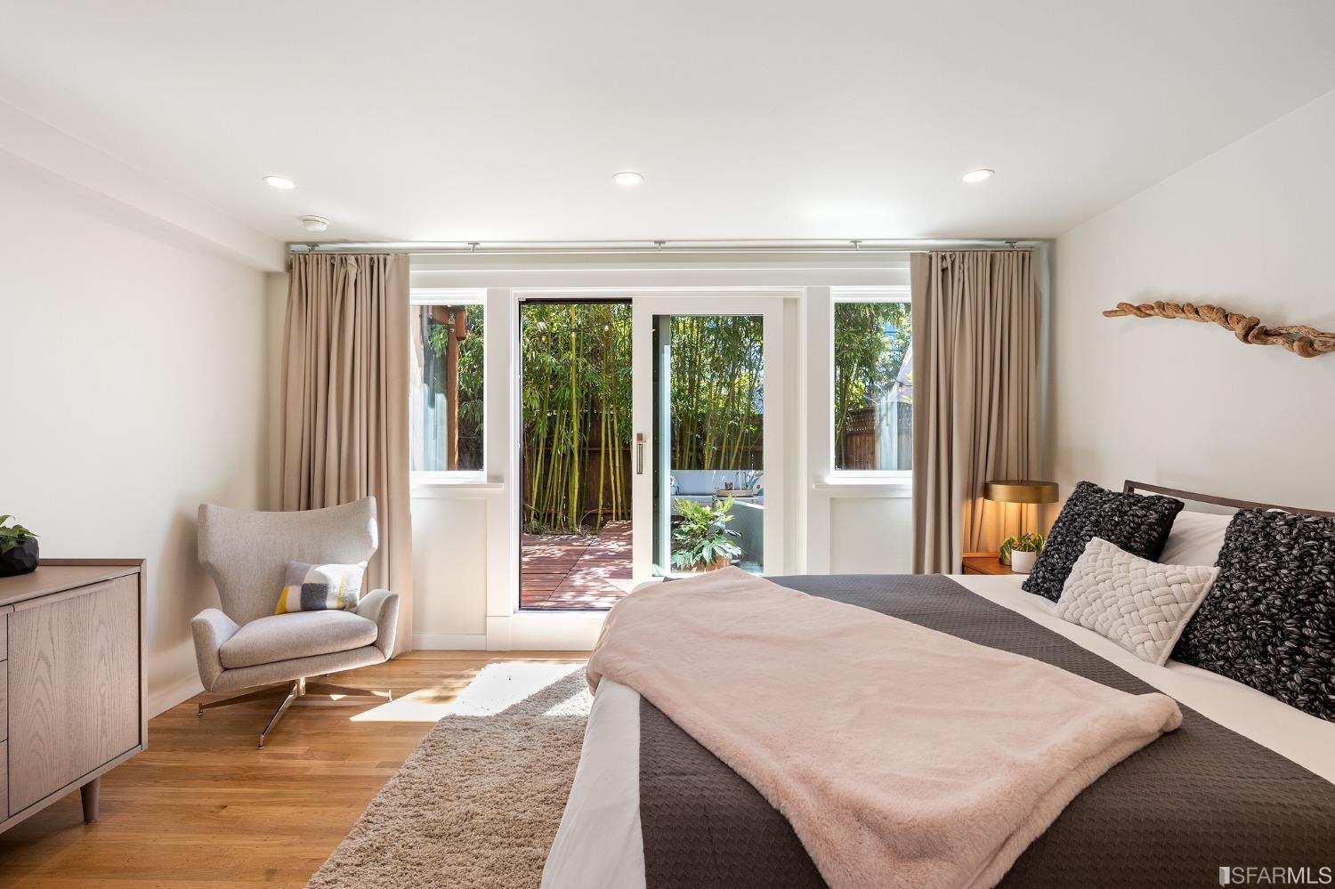 115 Wool Street San Francisco, CA 94110 - Photo 29 of 37 a living room with furniture and large windows