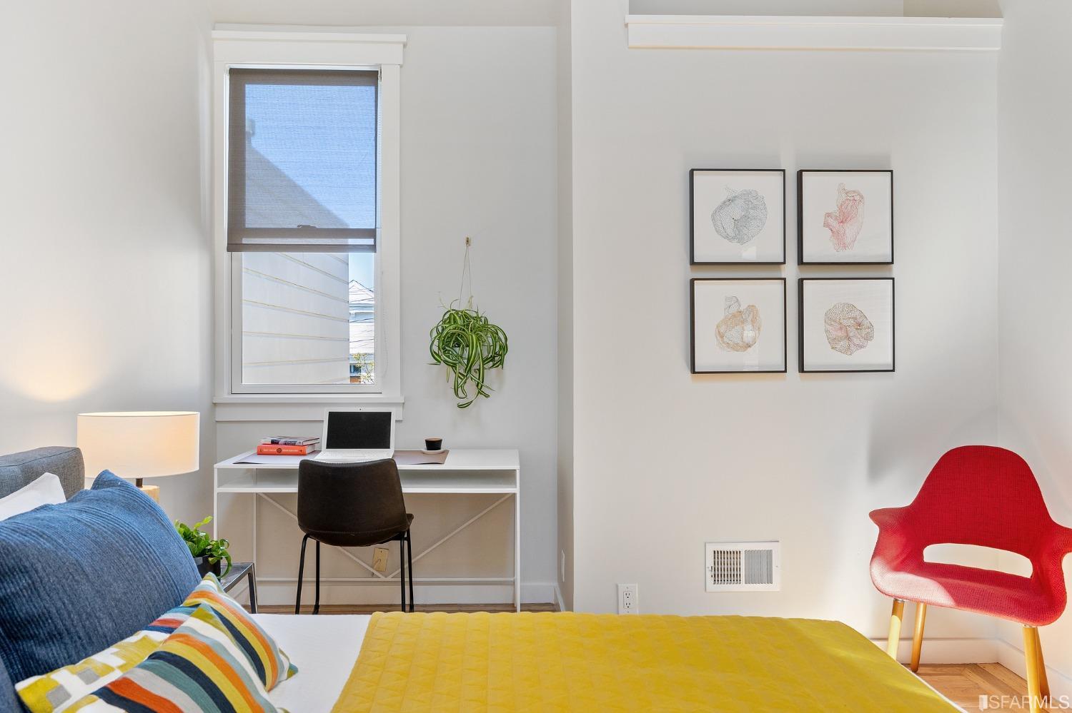 115 Wool Street San Francisco, CA 94110 - Photo 32 of 37 a bed room with a bed and a chair