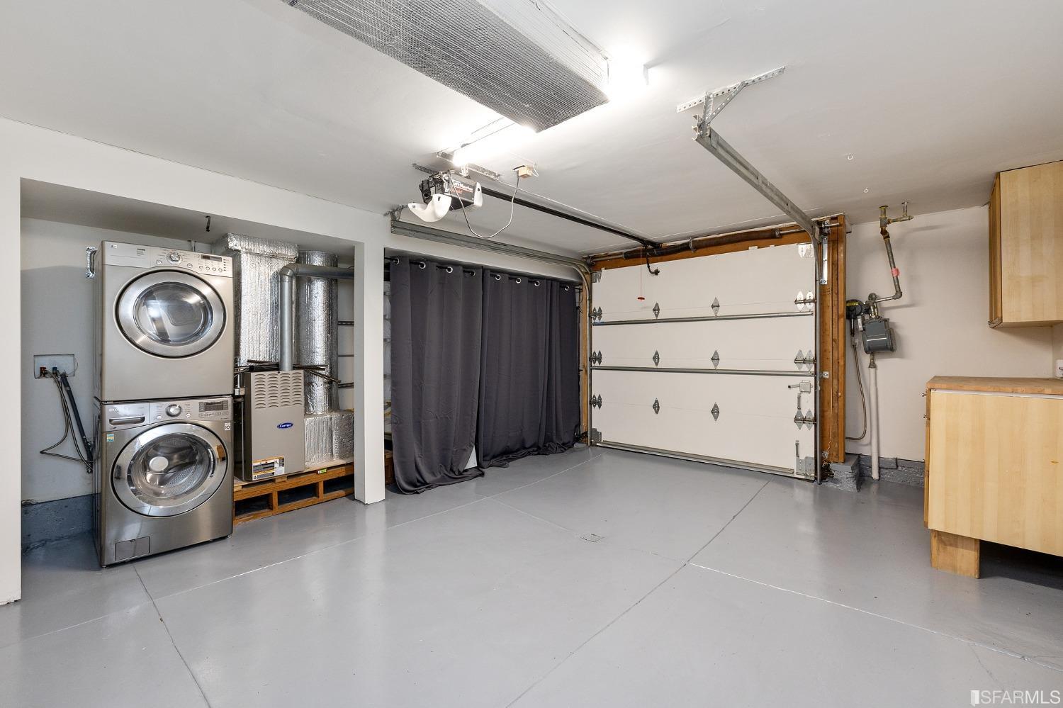 115 Wool Street San Francisco, CA 94110 - Photo 35 of 37 a view of a storage & utility room with washer and dryer