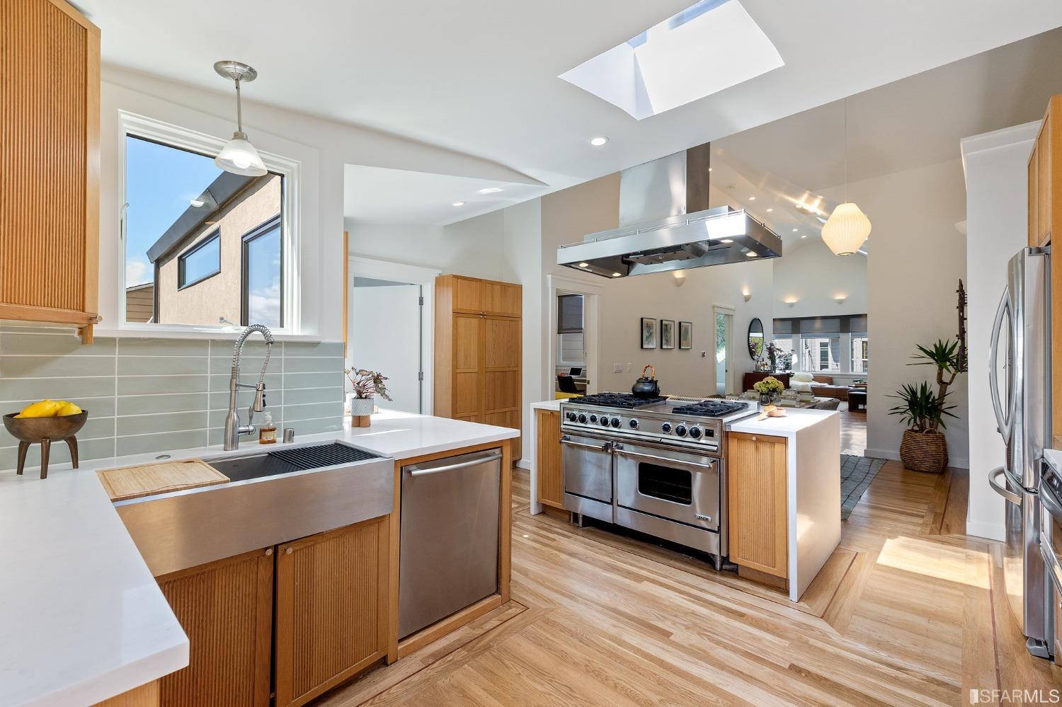 115 Wool Street San Francisco, CA 94110 - Photo 4 of 37 a kitchen with a sink stove and refrigerator